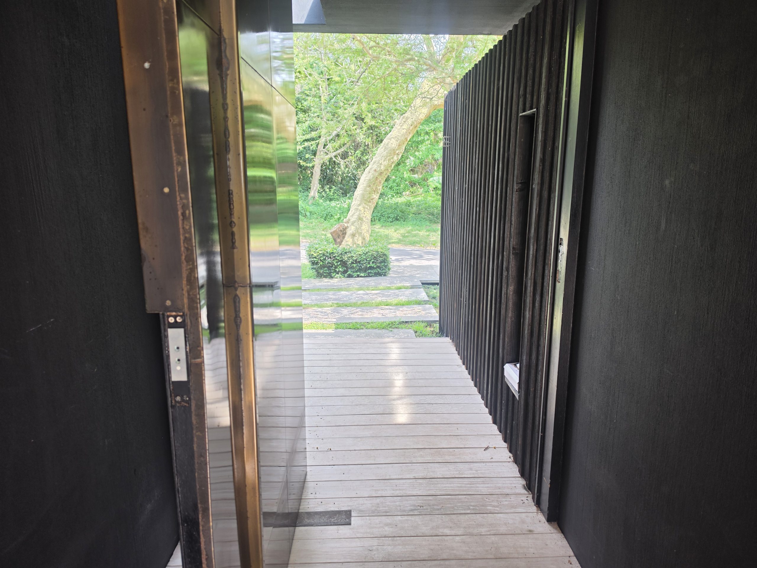 Large wooden entrance door in Umdloti — Zapture access control installation