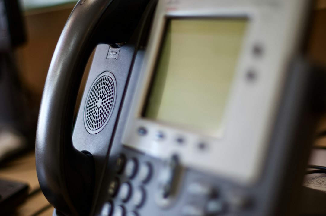 Business telephone illustrating AI-powered VoIP and intelligent call routing